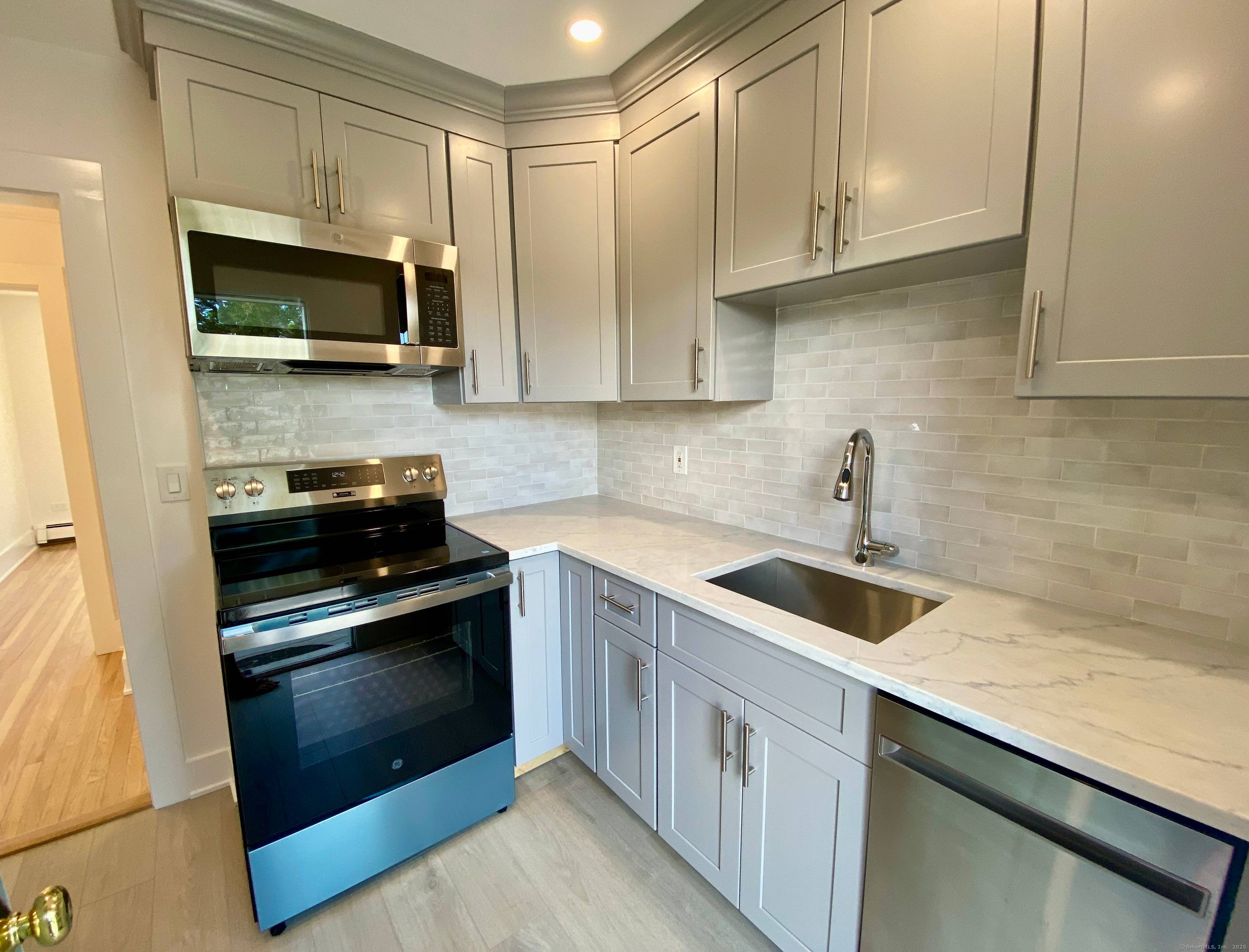 Fabulous newly renovated two bedroom apartment located in sought after area, one block from town.
