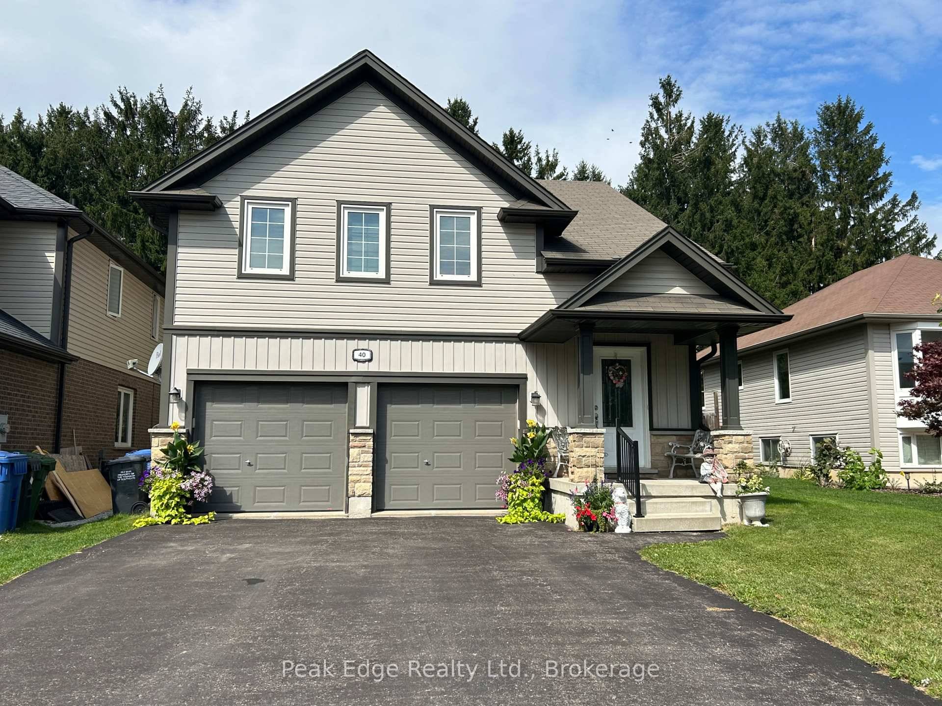 Discover the charm and functionality of this 3 bedroom, 2 bathroom home with open concept main floor which offers hardwood and dining area with walkout to 2 tiered deck and ...