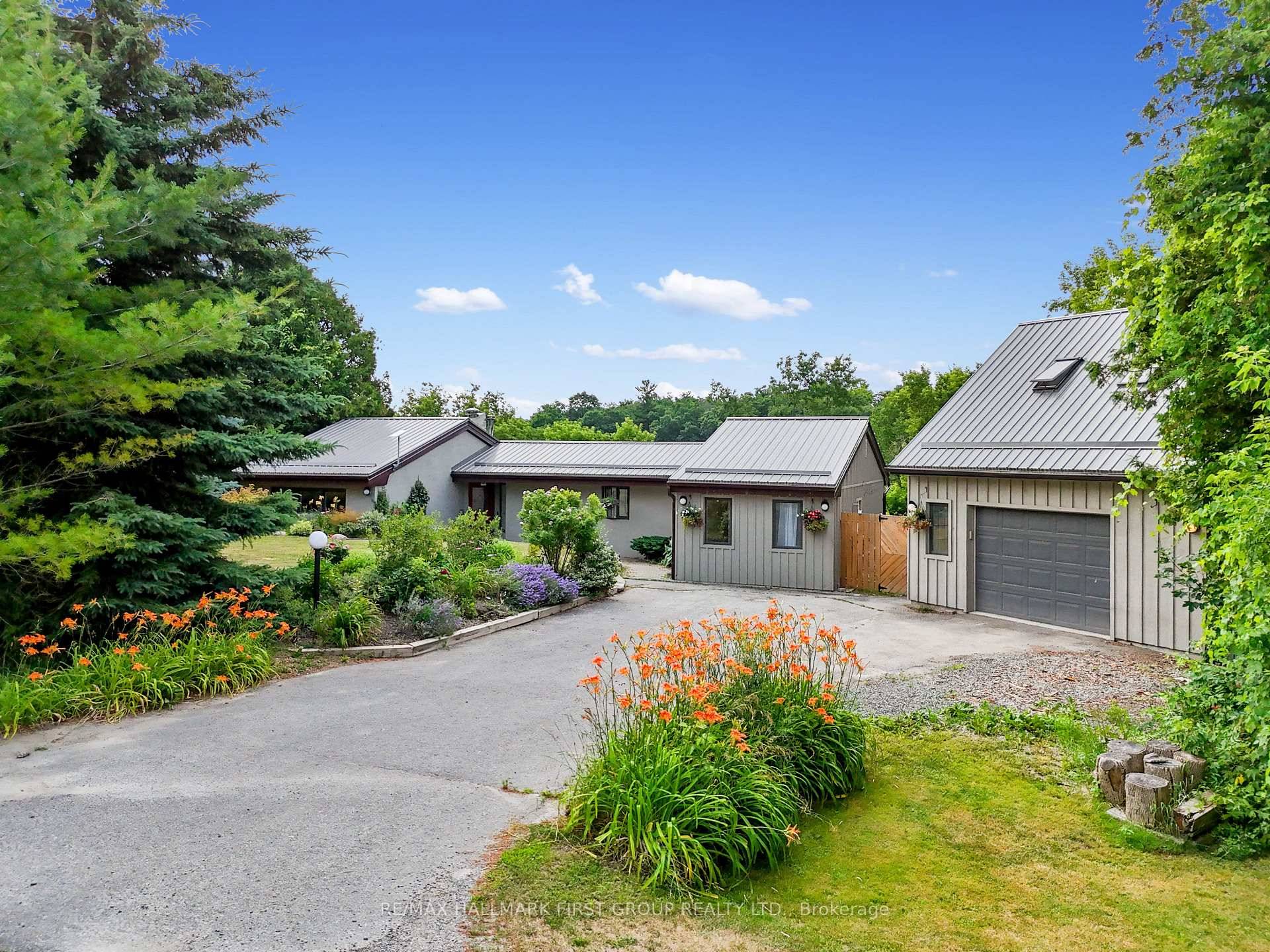 Tucked amid 1. 74 acres of serene, forested landscape, this one of a kind home offers the perfect blend of charm, privacy, and natural beauty.