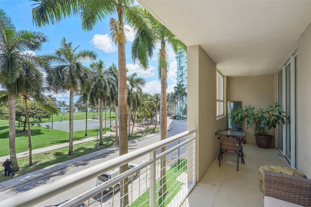 One of the largest 2 bedroom 2 bath 1258 sq ft layouts with rare double balcony directly facing Margaret Pace Park in Cite Condominium.