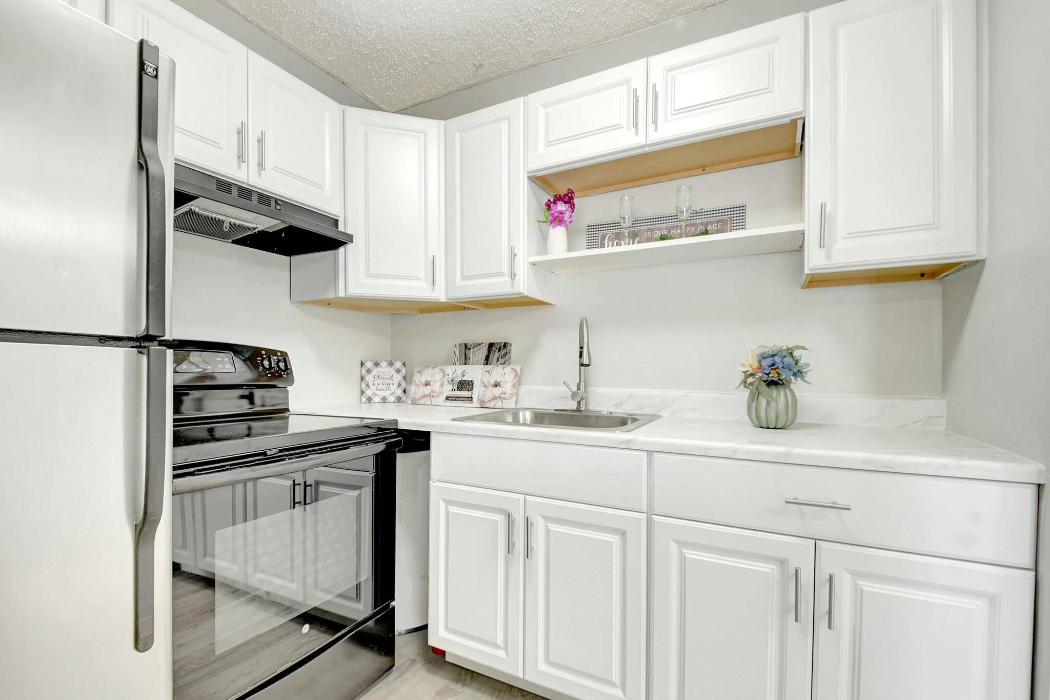 Welcome to 143 Sussex H, a charming first floor condo nestled in the heart of the vibrant 55 Century Village community in West Palm Beach, FL.