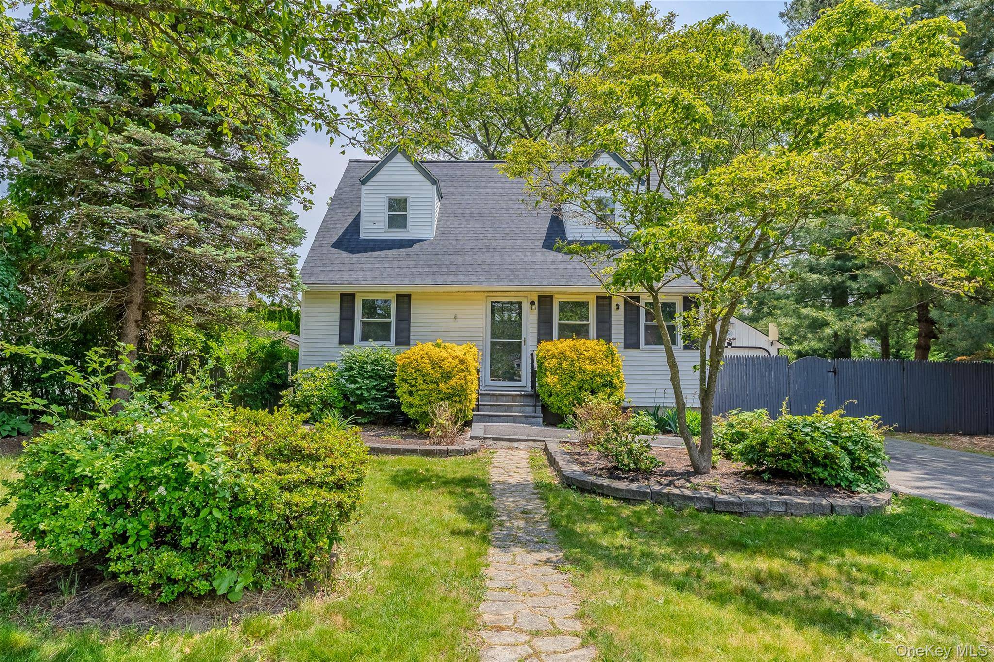 Welcome to this stunning renovated 4 bedroom, 2 bathroom home set in the heart of Manor Park within the highly desirable Eastport South Manor School District.