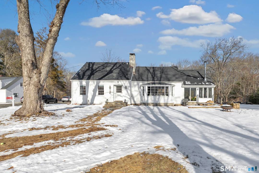 Tucked away in Norwalk's desirable Cranbury neighborhood, this fully renovated 3 bedroom, 2 full bath home sits on over 3 beautiful acres with a pond a rare and peaceful setting.