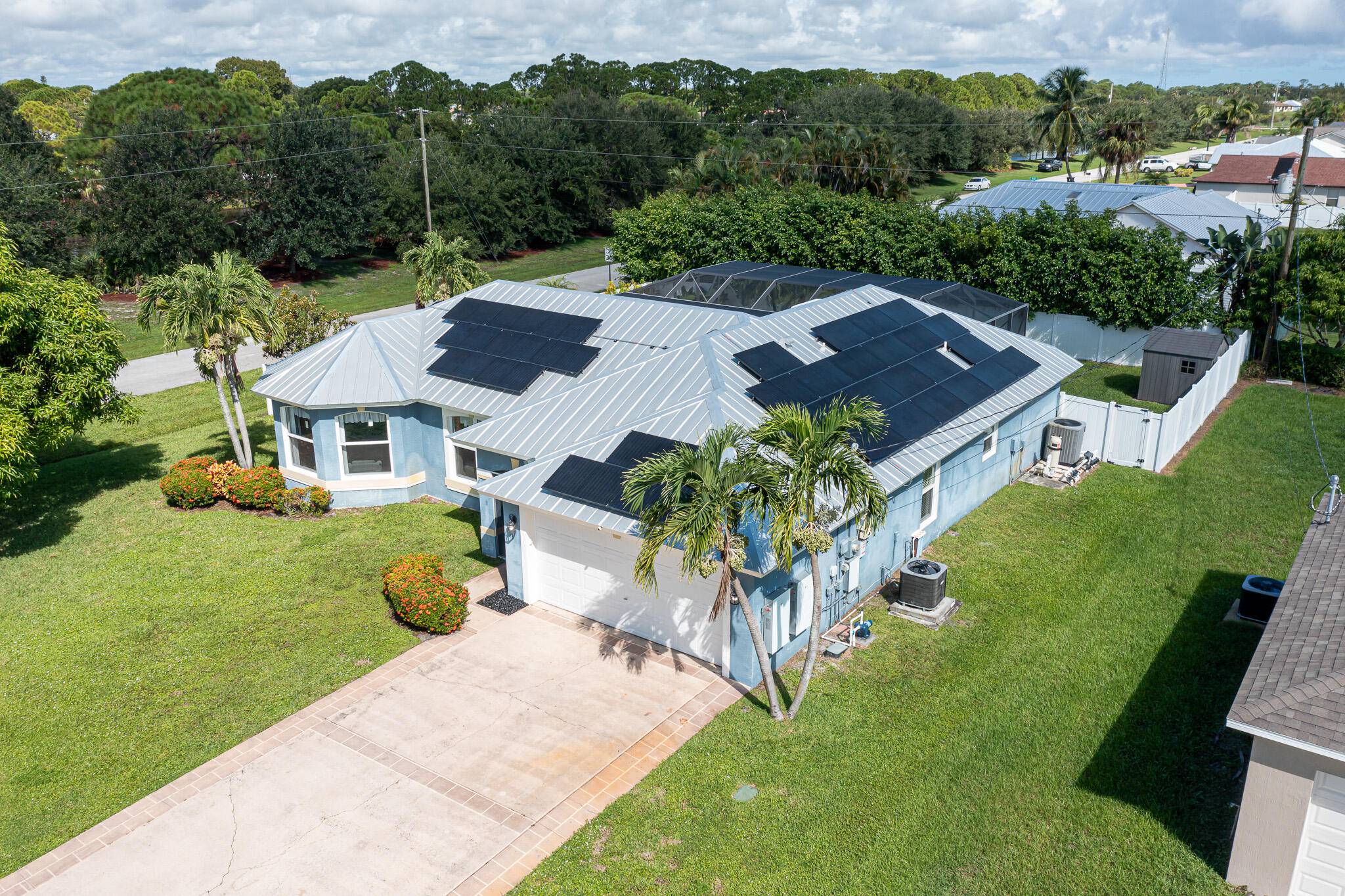 Welcome to 2443 SE Tracy Avenue, a stunning oasis in the heart of Port St.