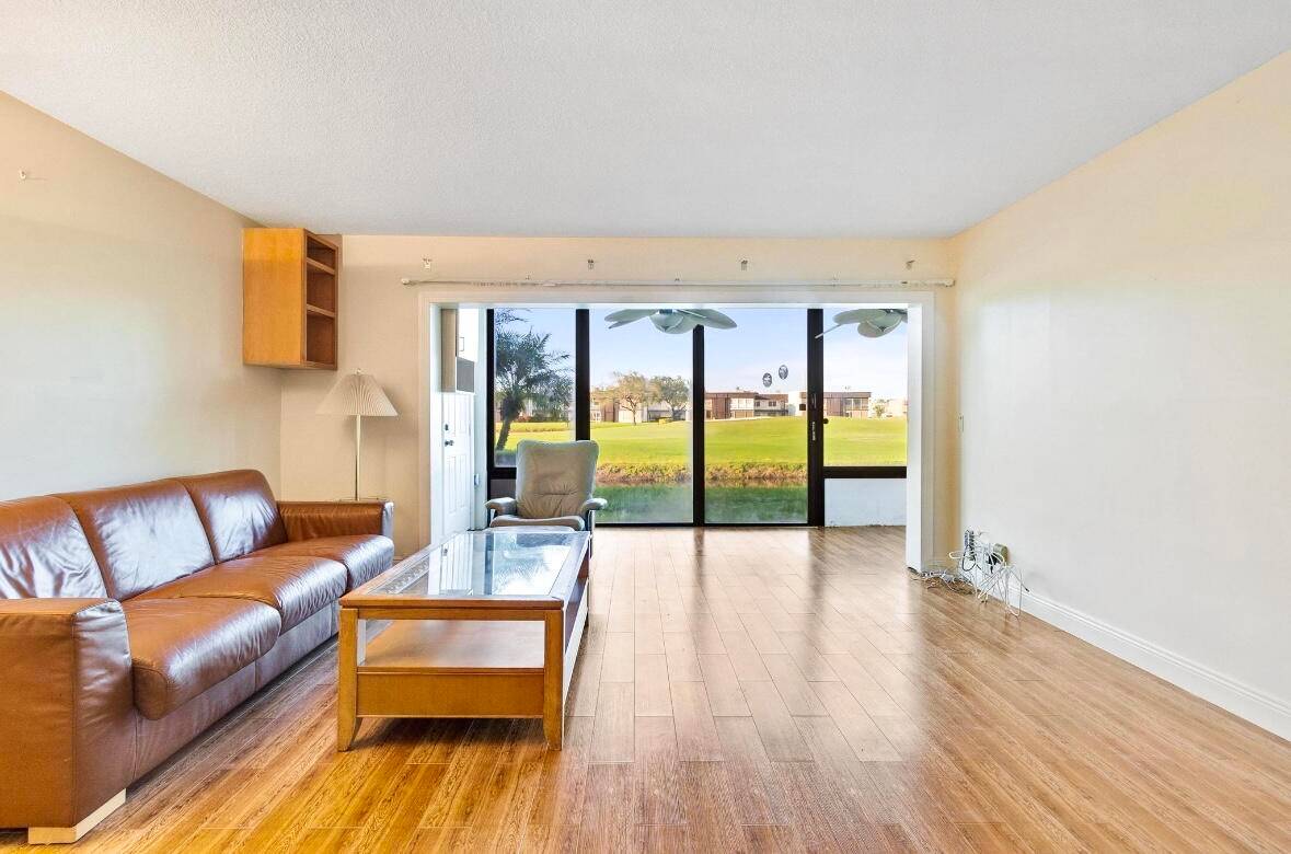 Beautifully updated 2 2 unit on the 1st floor with amazing views of the golf course right from the living room.