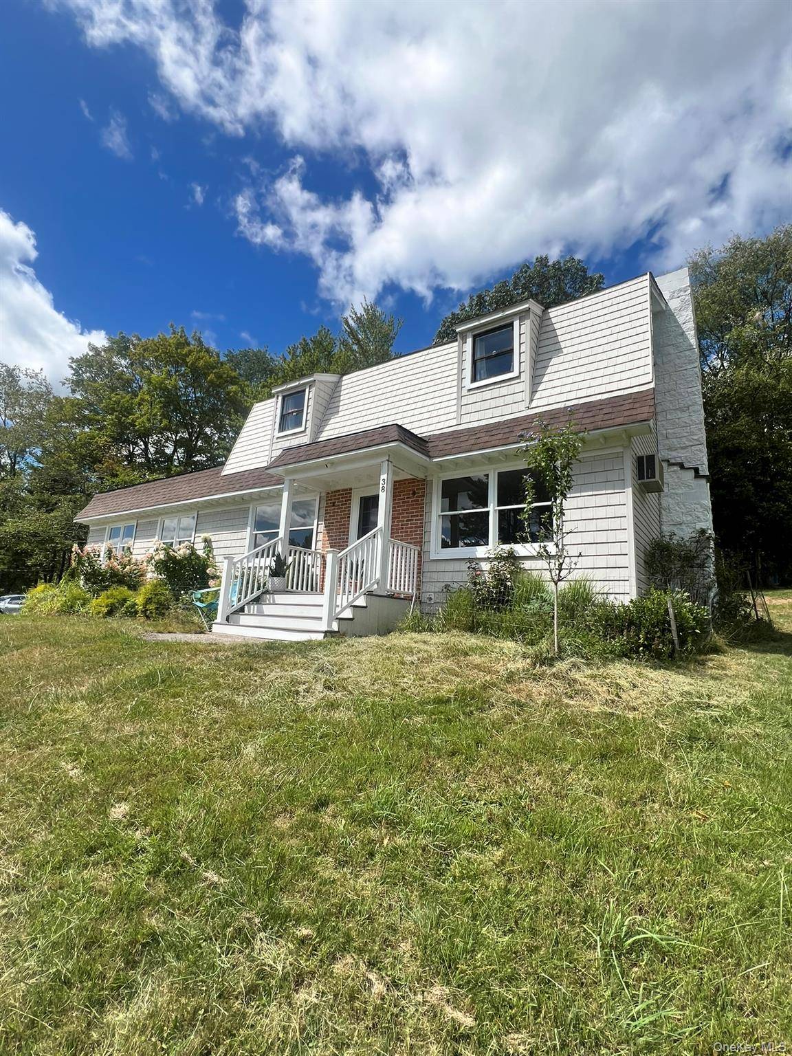 Renovated 4 Bedroom Home with Lake Rights on One Acre.