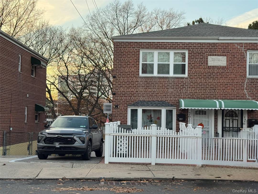 Welcome to 2027 Mayflower Avenue, a classic brick single family home located in the highly sought after Pelham Bay neighborhood on one of the quietest streets.
