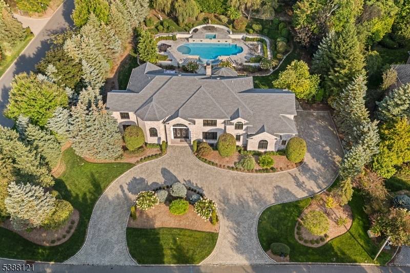A stately brick Colonial located in the prestigious East Hill Estates.