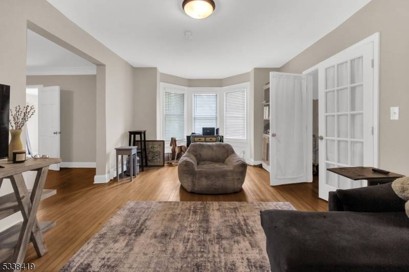 This one of a kind, legal three family home seamlessly blends historic character with modern convenience.