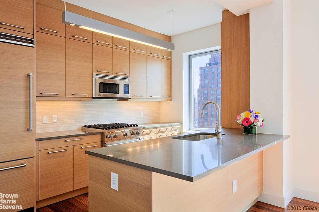 Apartment 19D is a stunning 2 bedroom, 2 1 2 bathroom residence with picturesque city views and a large balcony.