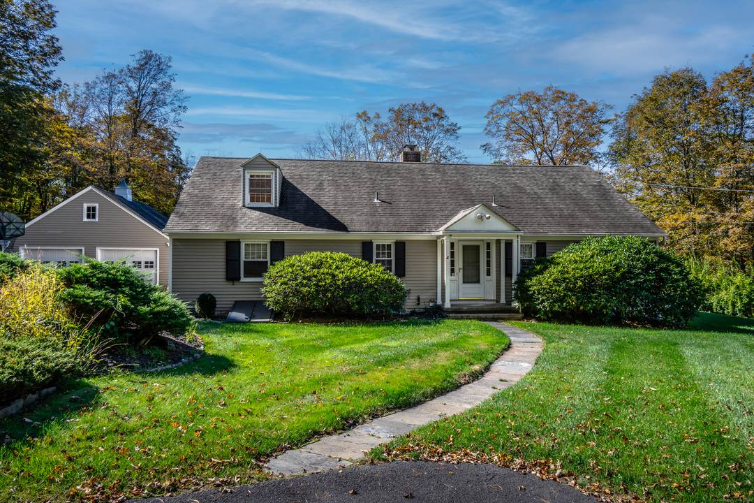 Welcome to this charming three bedroom, two and a half bath ranch, set on nearly 3 beautifully landscaped acres that offer both privacy and curb appeal.