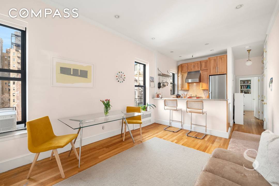 Sun Filled Pre War Perfection with Iconic City Views 1 block from Central Park !
