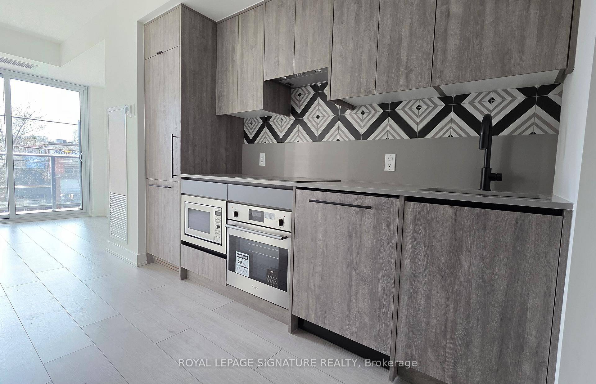 Welcome to The Twelve Hundred a boutique residence that artfully combines contemporary living with the storied charm of Toronto.