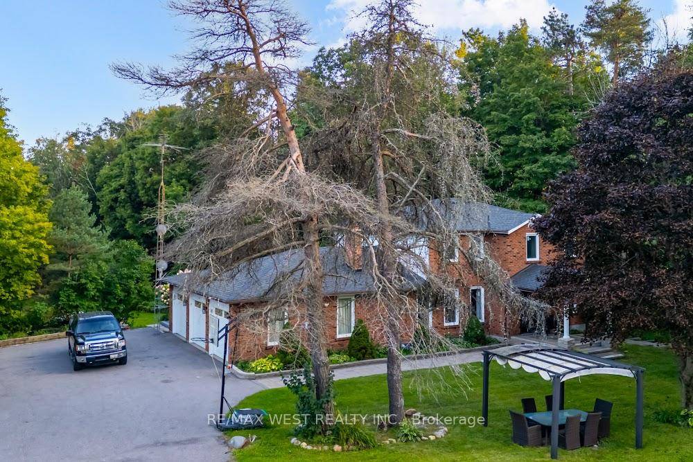 Renovated 4 2 bedroom brick home on over 10 acres in sought after Goodwood Estates !