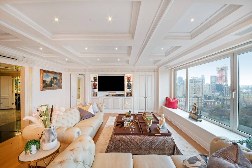 Perched high above Central Park on the 33rd floor of the JW Marriott Essex House, this two bedroom, two and a half bathroom hotel condominium residence is a unique home.