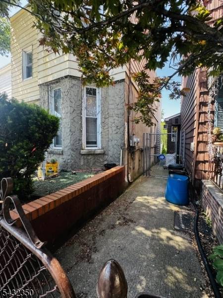 Situated on a tranquil dead end street in the vibrant heart of Jersey City, offers a premier opportunity for investors or primary residents seeking a high potential multi family property.