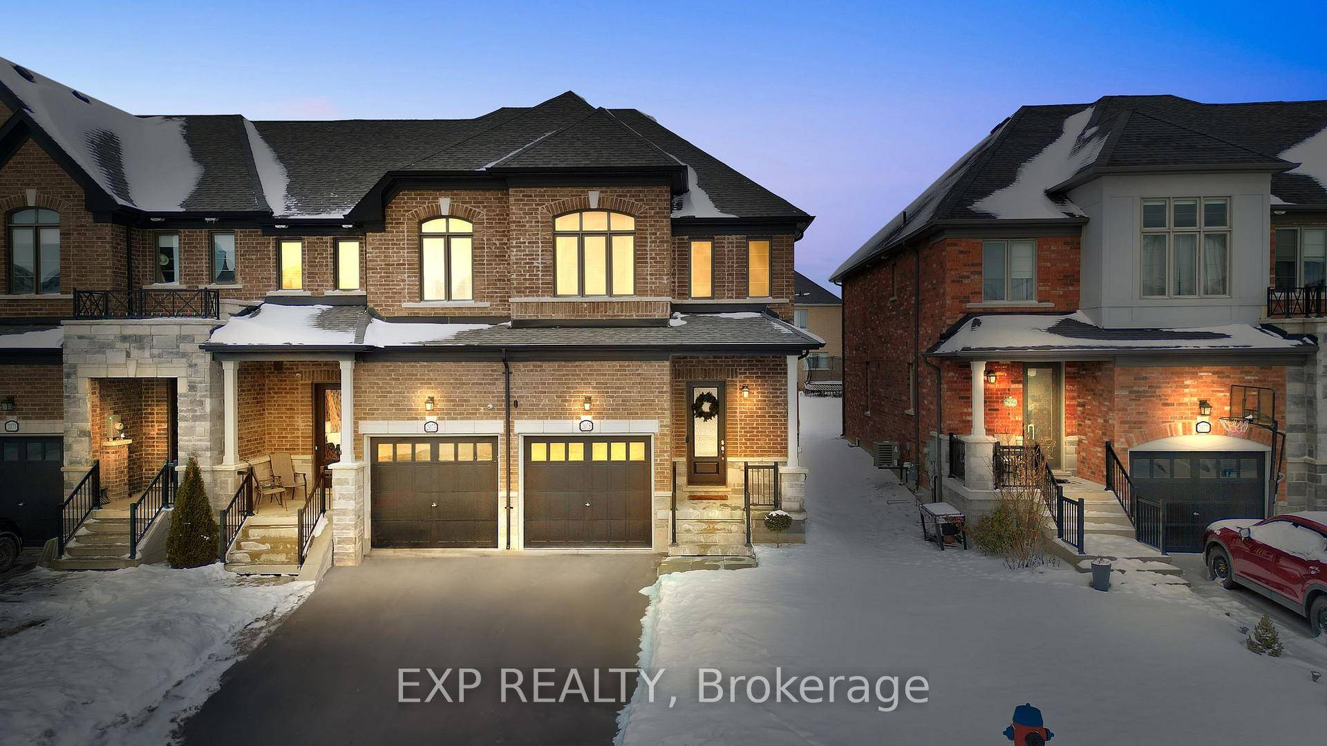 Experience Luxury In This Corner Unit Townhouse, Situated Beside A Serene Pond.