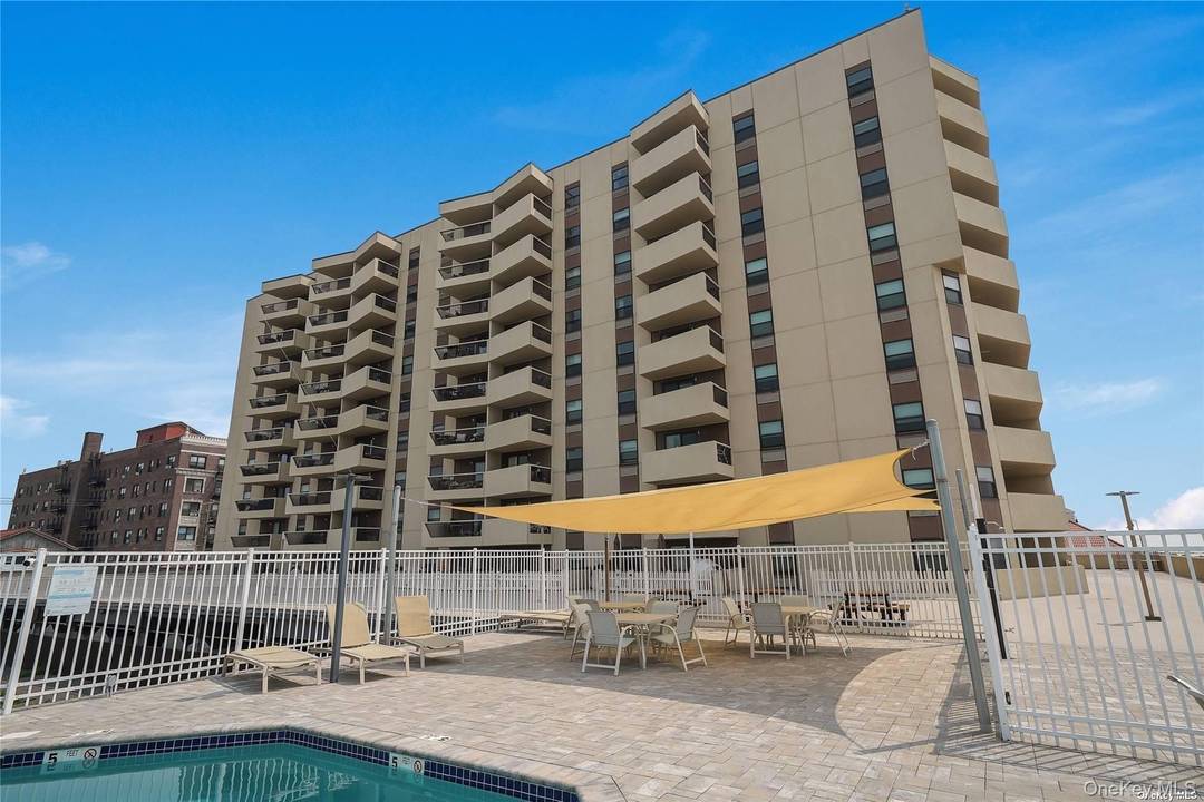 Luxury Building along beautiful Long Beach boardwalk, Beautiful Ocean Views from terrace.