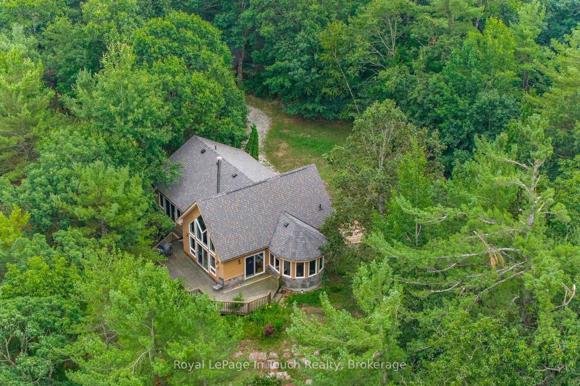Welcome to 390 Island 360, a rare and remarkable offering on Hungry Island on beautiful Six Mile Lake.