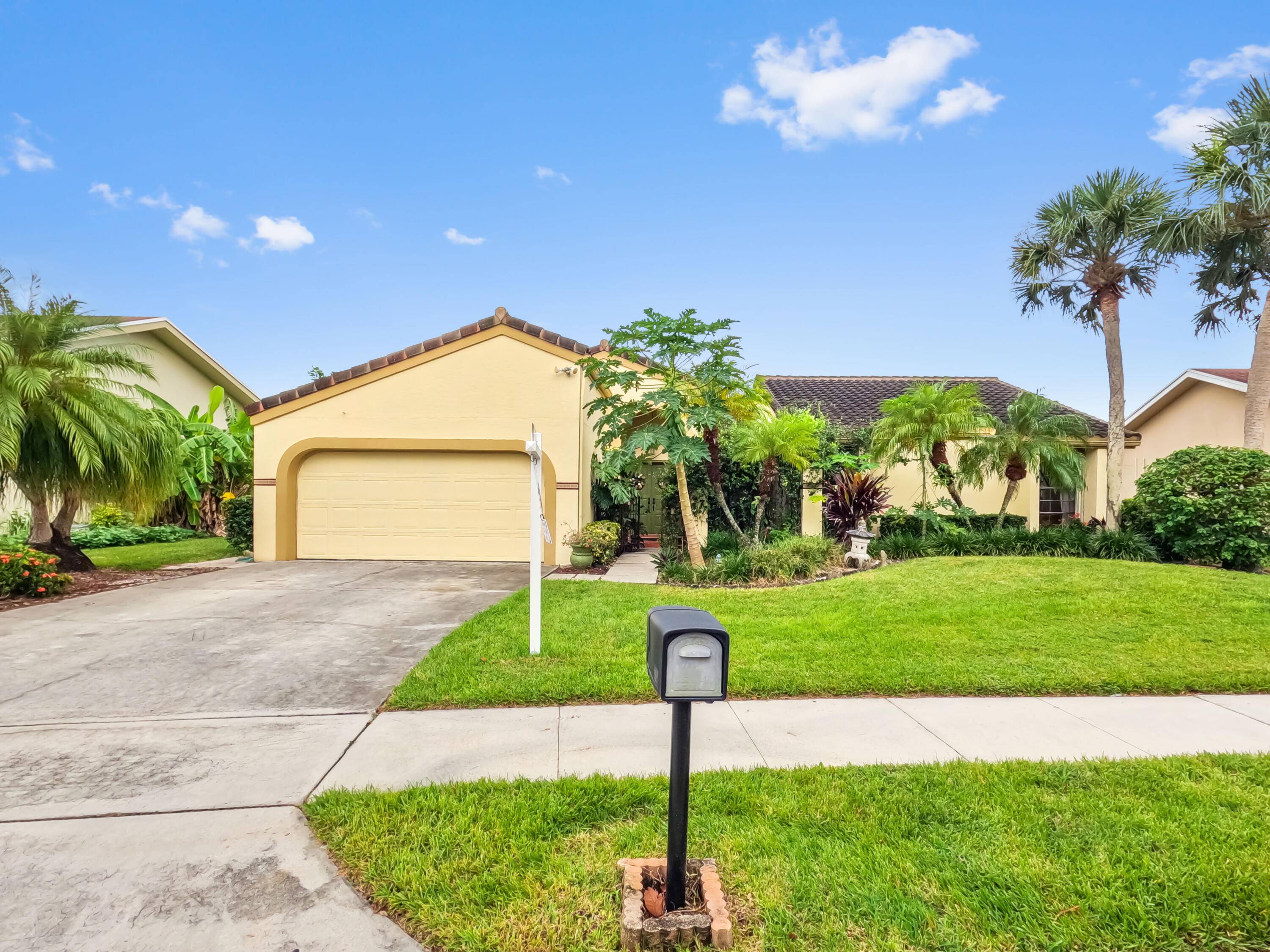 This stunning lakefront home in the highly desirable Elysium community of Royal Palm Beach is a truly unique find.