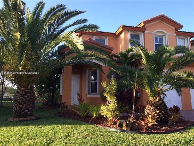 BEAUTIFUL COACH HOME, CORNER LOT WITH LAKE VIEW.