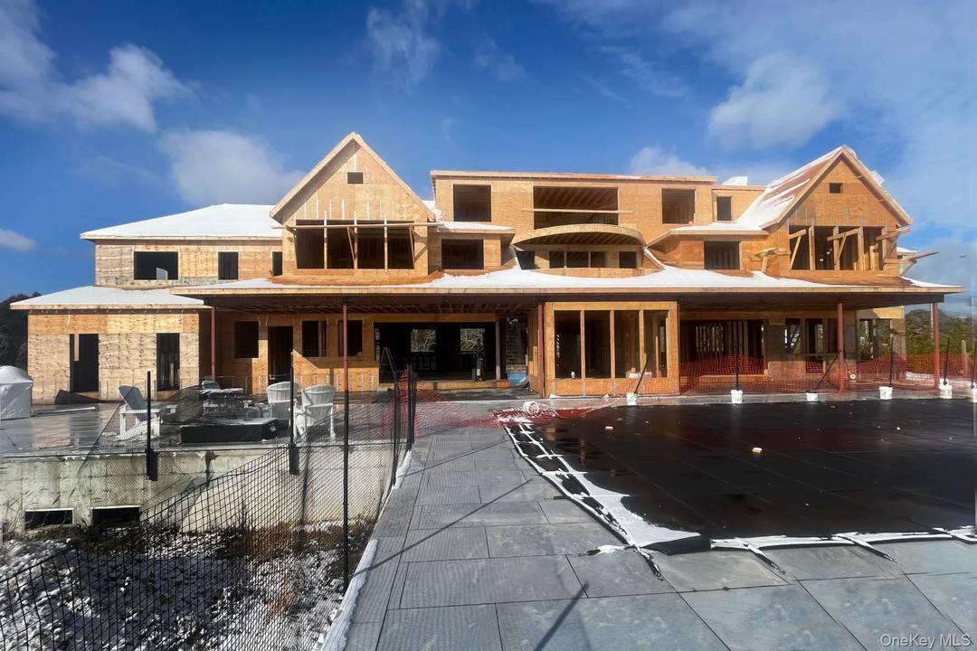 Welcome to 40 Quaquanantuck, a rare and coveted waterfront property in the heart of historic Quogue Village.