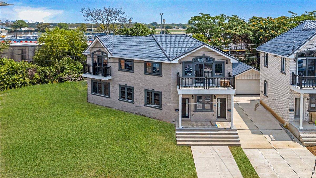 Step into luxury living with this stunning, newly built 2 story brick home that perfectly balances modern elegance and everyday comfort.