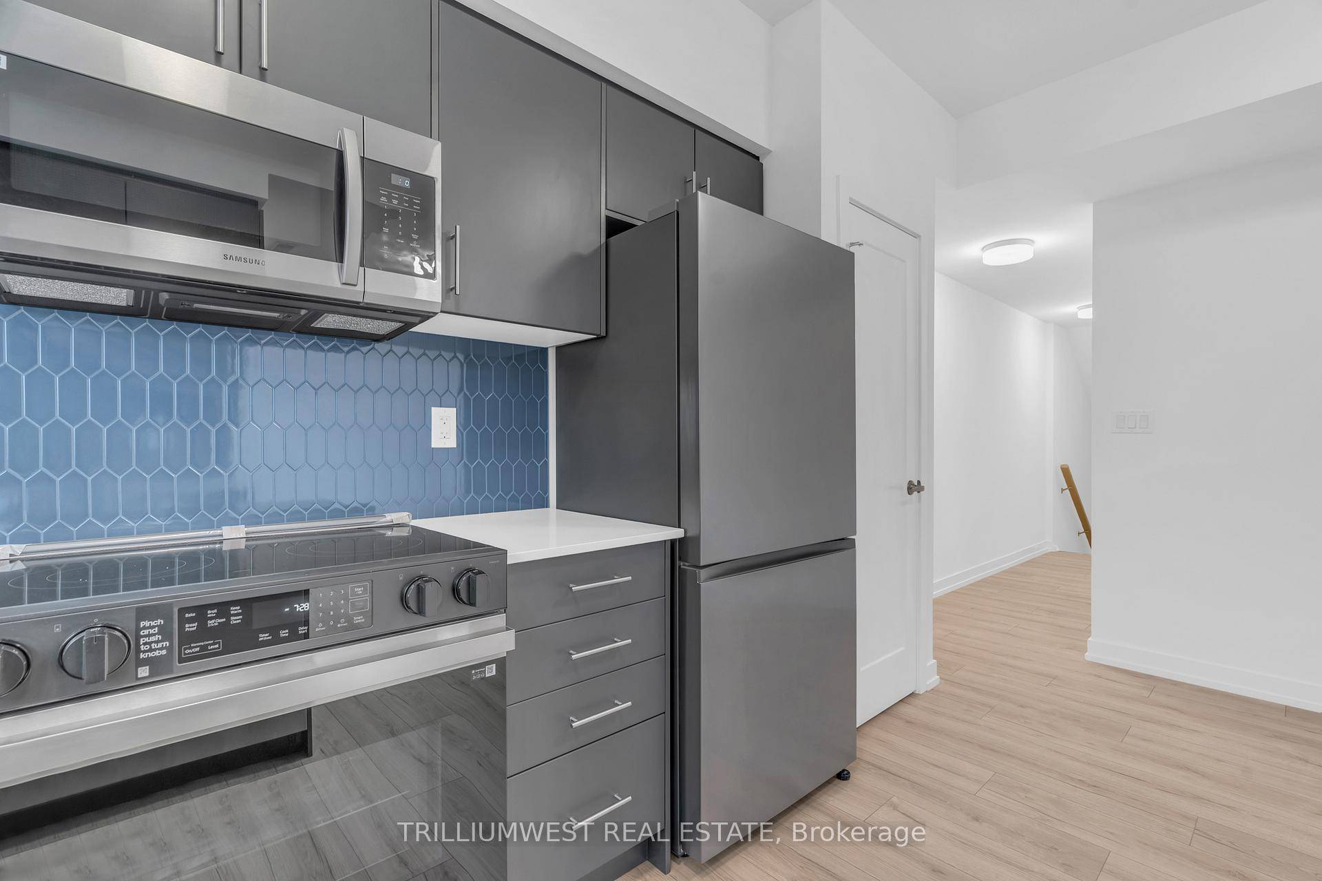 AVAILABLE NOW ! Be the first to live in this BRAND NEW 2 bedroom, 2 bathroom stacked townhome in Fergus's sought after Sunrise Grove community !