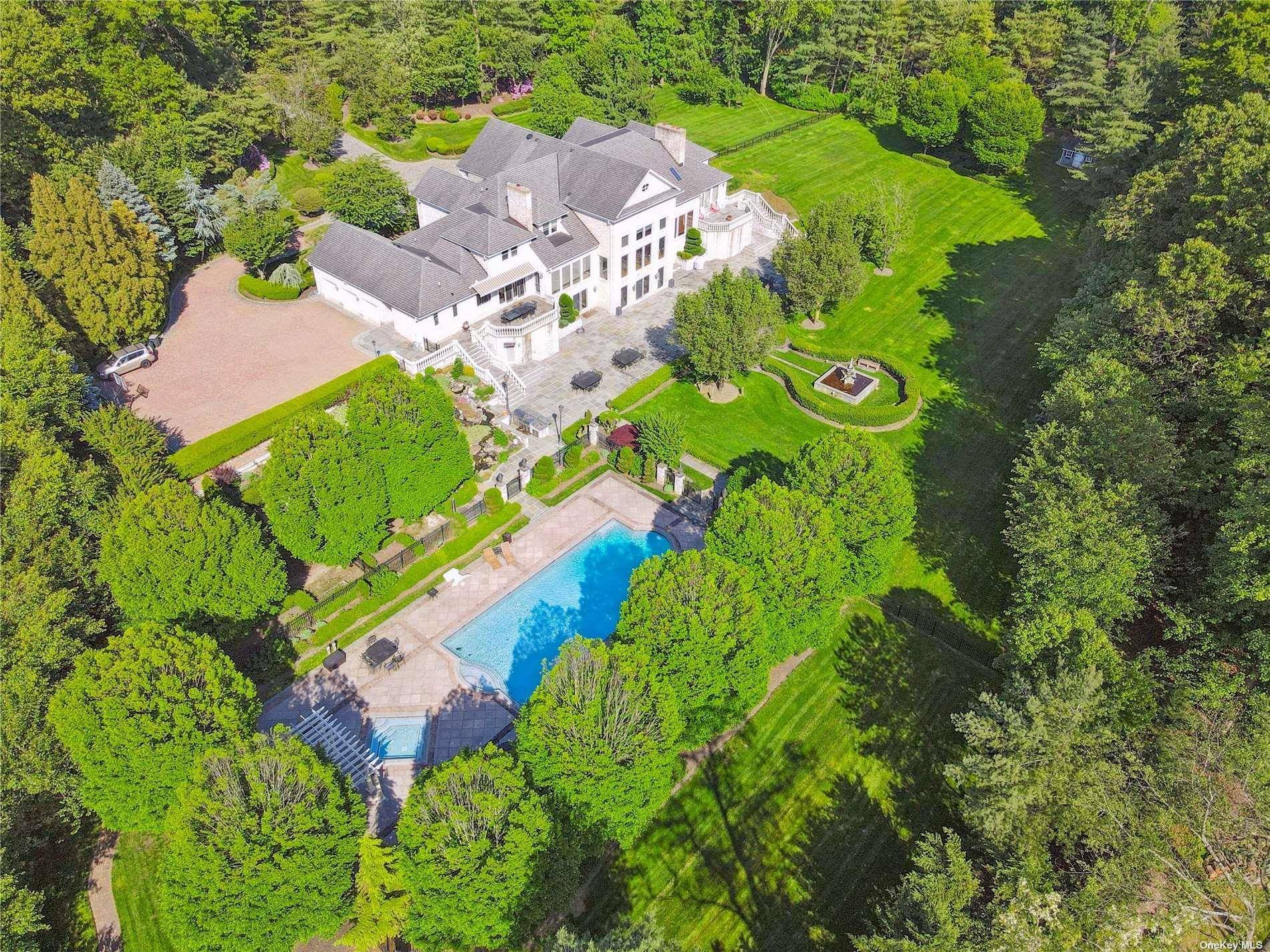 Magnificent newer estate in the Village of Lattingtown located in the private enclave known as Lands End.