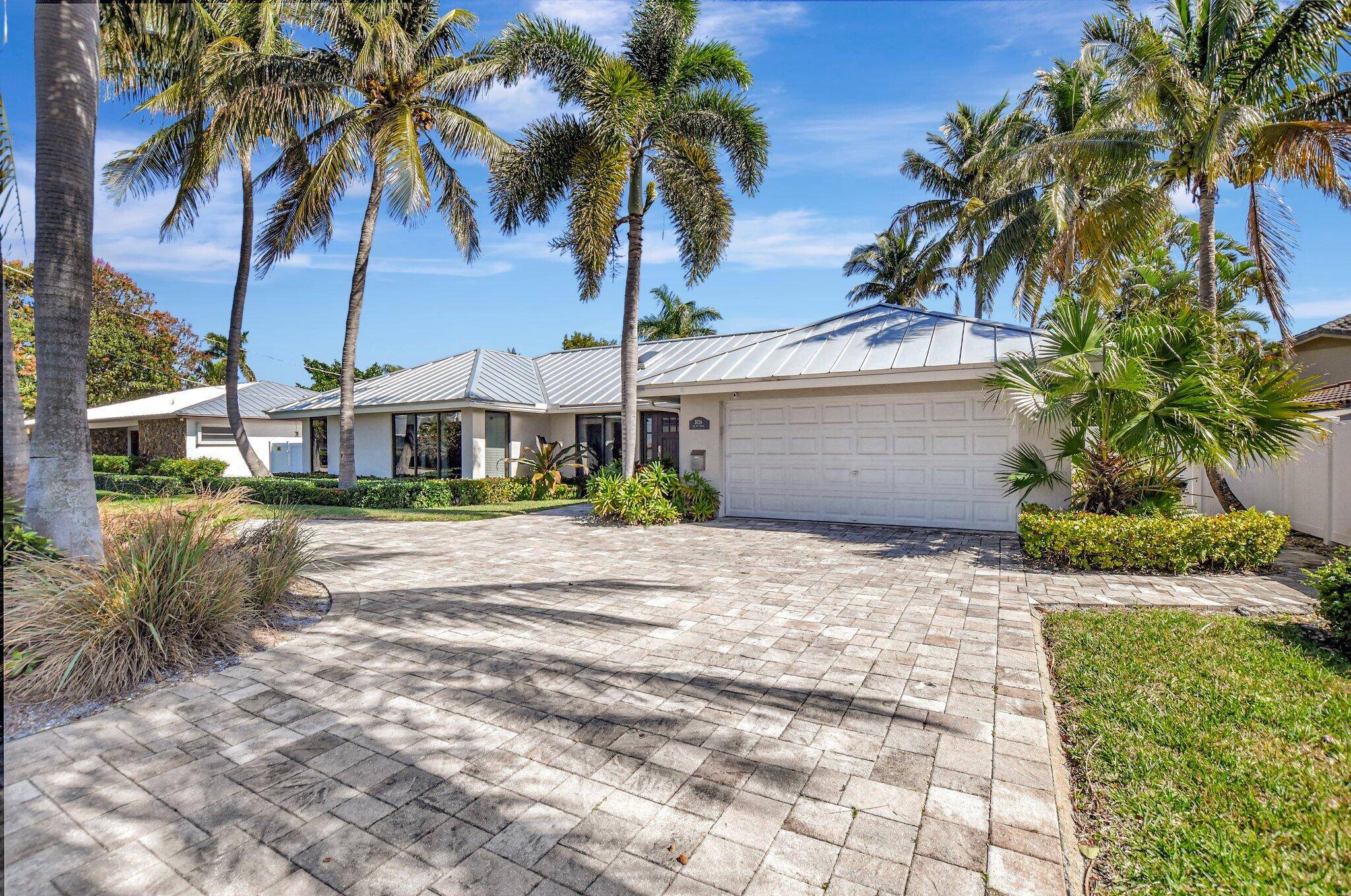 A rare opportunity to own on the water in an exclusive neighborhood in east Boca Raton with NO HOA.