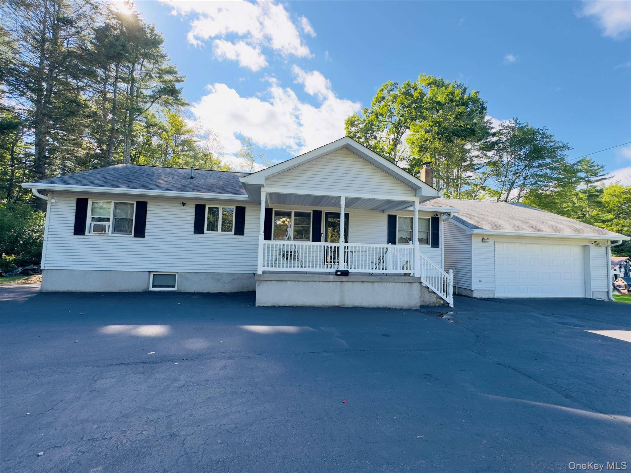 Step into comfort and charm with this beautifully maintained home nestled in a peaceful residential setting in the Town of Yulan.