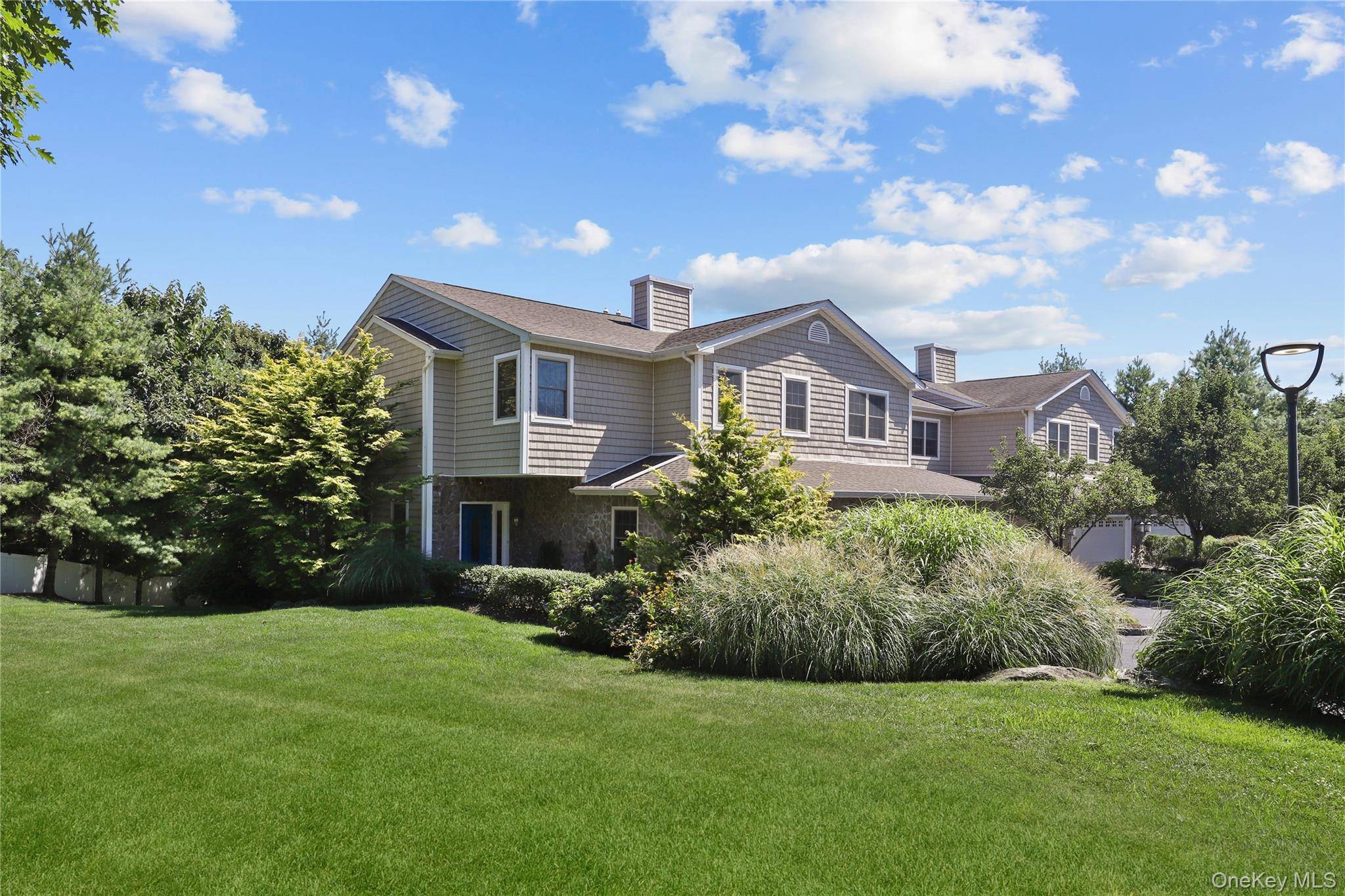 Flooded with natural light, this elegant residence offers a thoughtfully designed open concept floor plan that seamlessly connects the living, dining, and kitchen areas.