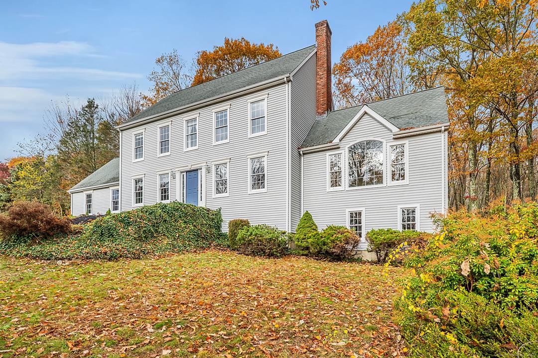 Welcome to your own retreat, this custom built grand Colonial is nestled at the end of a cul de sac street with stunning views of nature from every window.
