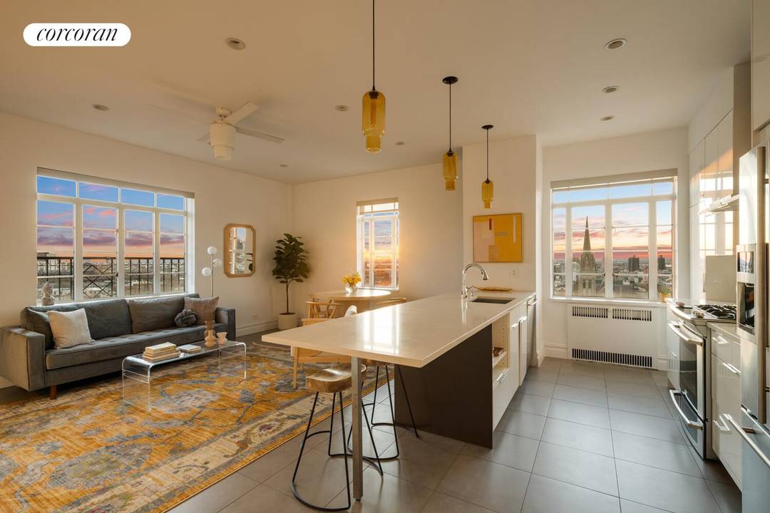 Extraordinary views, captivating sunsets, and walls of windows define this stunning top floor two bedroom, one bath co op in the clouds.