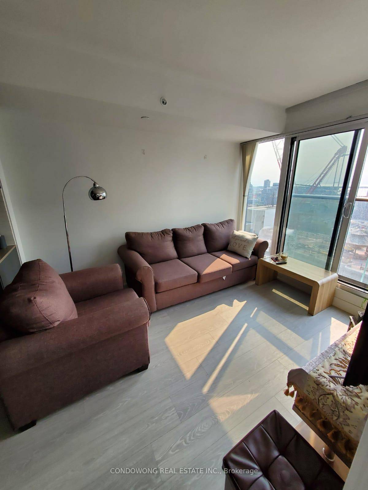 1 Bedroom Den At Centrecourt's Grid Condos With South Facing Balcony View.