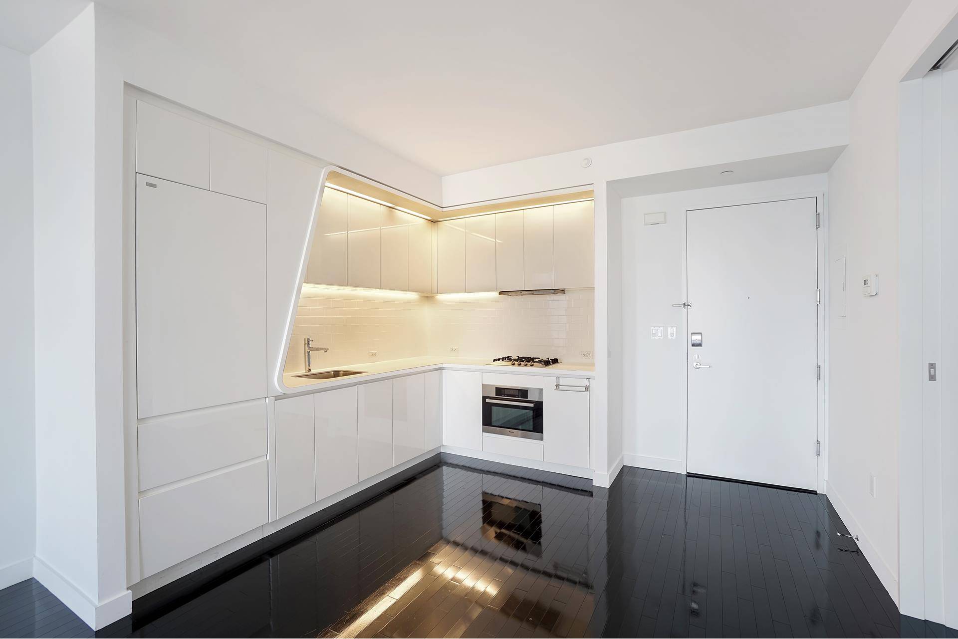 Impeccably styled one bedroom apartment on a high floor with stunning northern views of NYC's skyline, 9 11 Memorial Park, Statue of Liberty, and beyond.