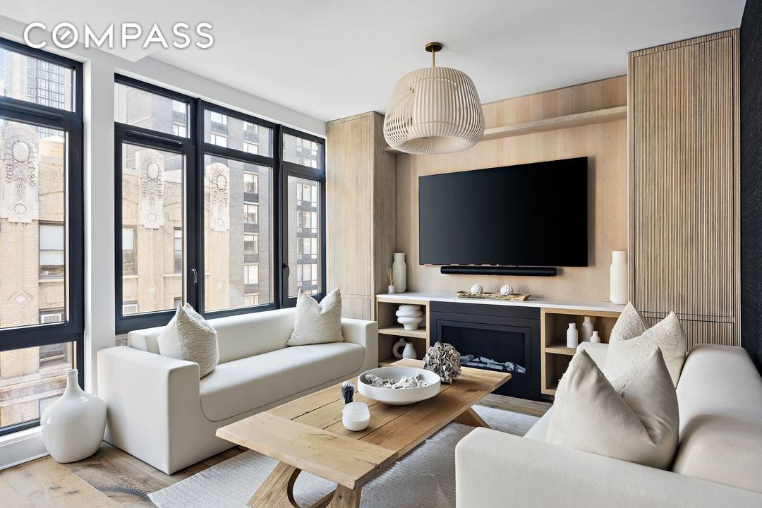 The Penthouse at 128 W 26th Street is a bright, contemporary 1, 426 square foot, floor through apartment.