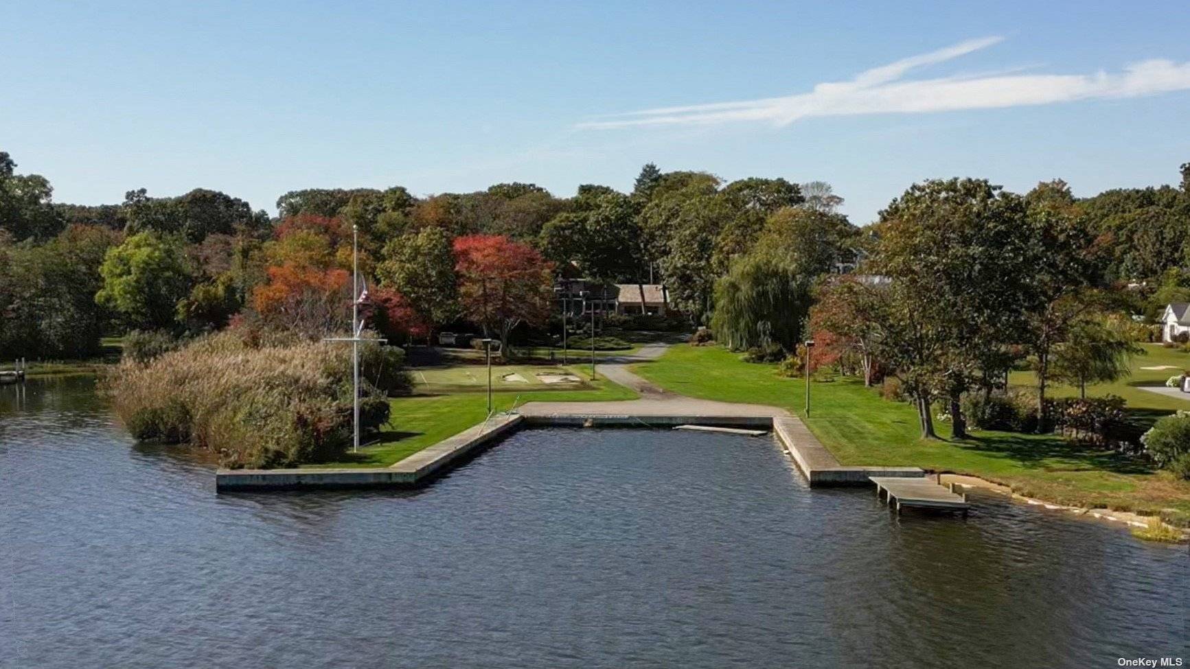 Prime location ! One of the largest lots on Great River.