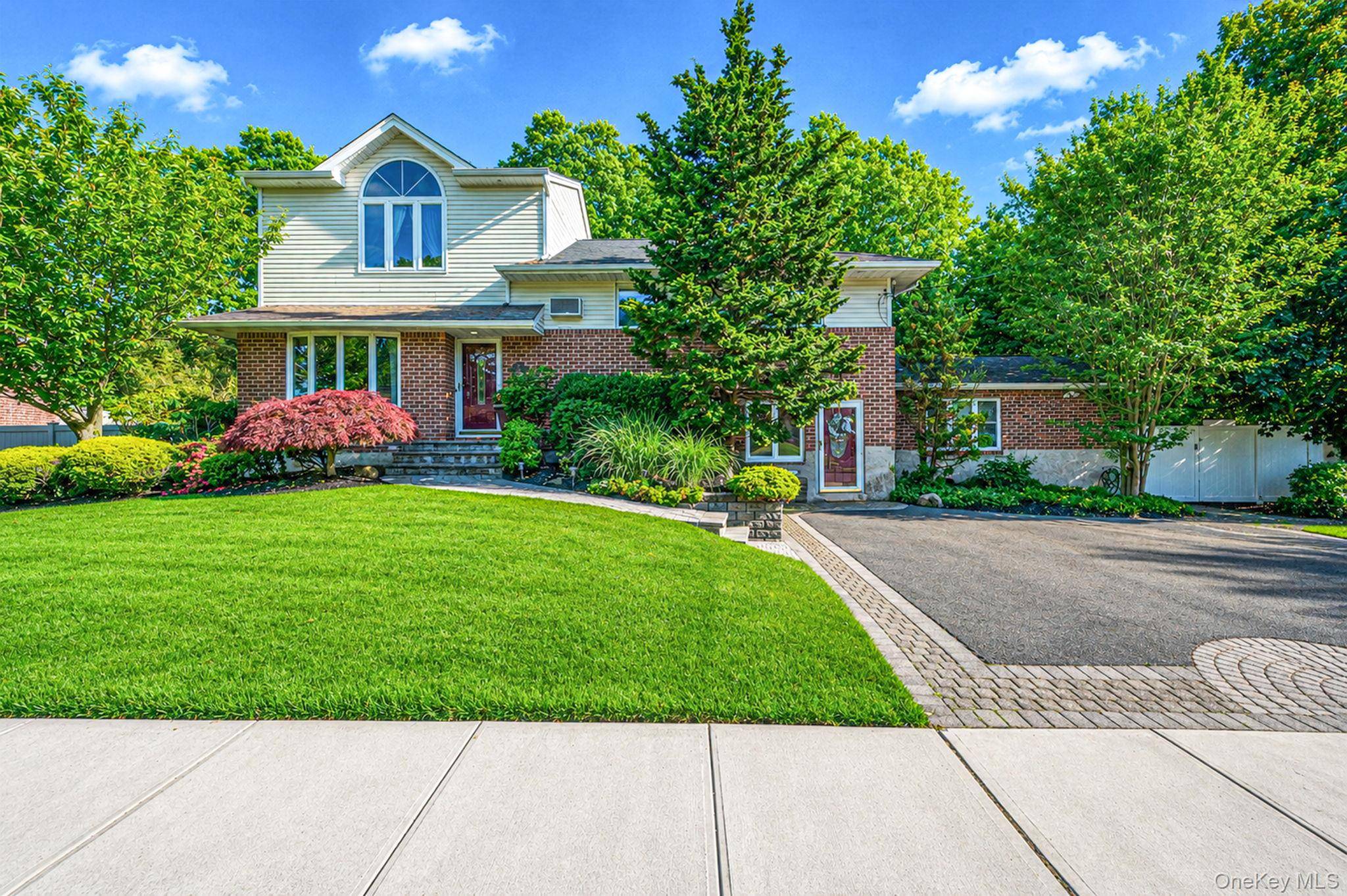Welcome to this warm and inviting 5 bedroom, 4 bath home in the heart of Massapequa Park, offering comfort, flexibility, and endless possibilities.