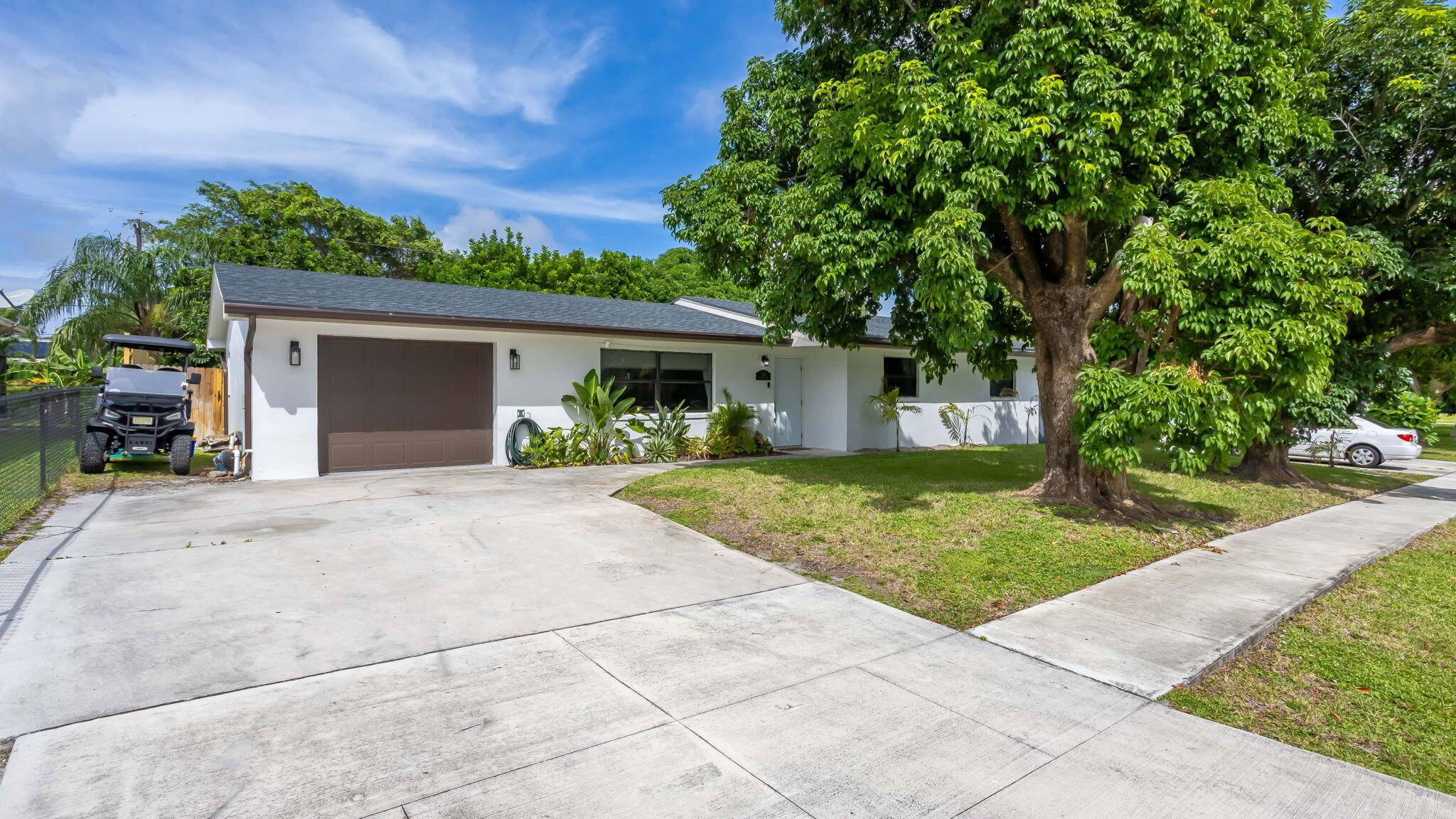 Step into modern coastal sophistication in this beautifully renovated Boynton Beach residence, where timeless style meets effortless living.