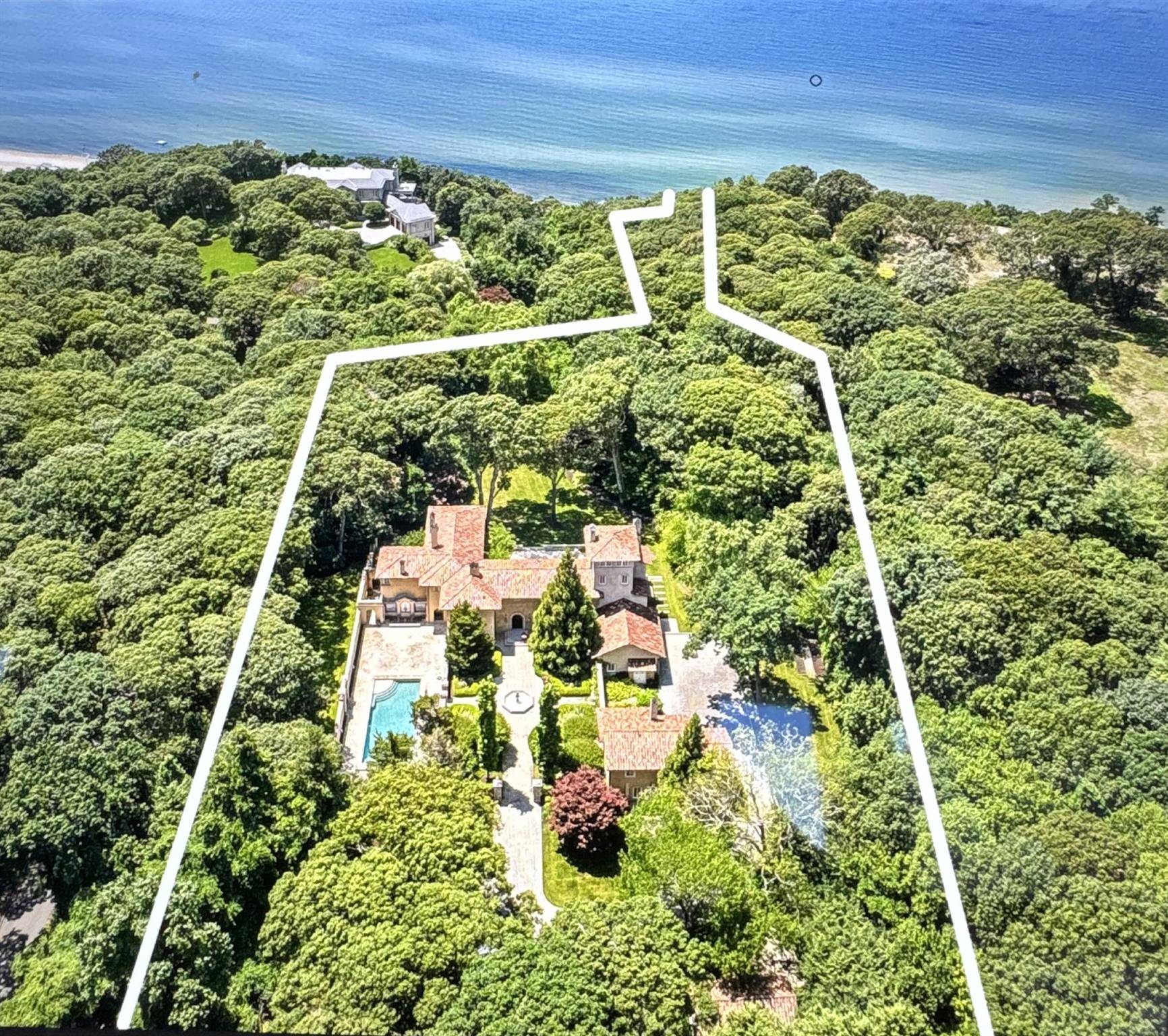 Exquisite Tuscan Inspired Estate Just Steps from the Beach.