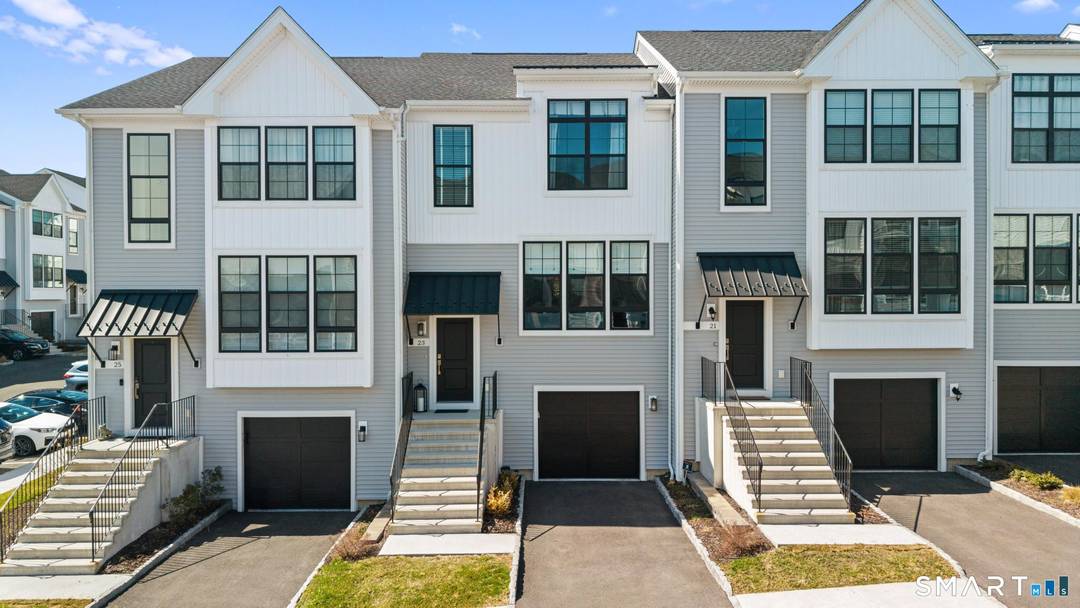 Welcome to 23 East Cross, a meticulously maintained townhome where thoughtful design meets modern living.