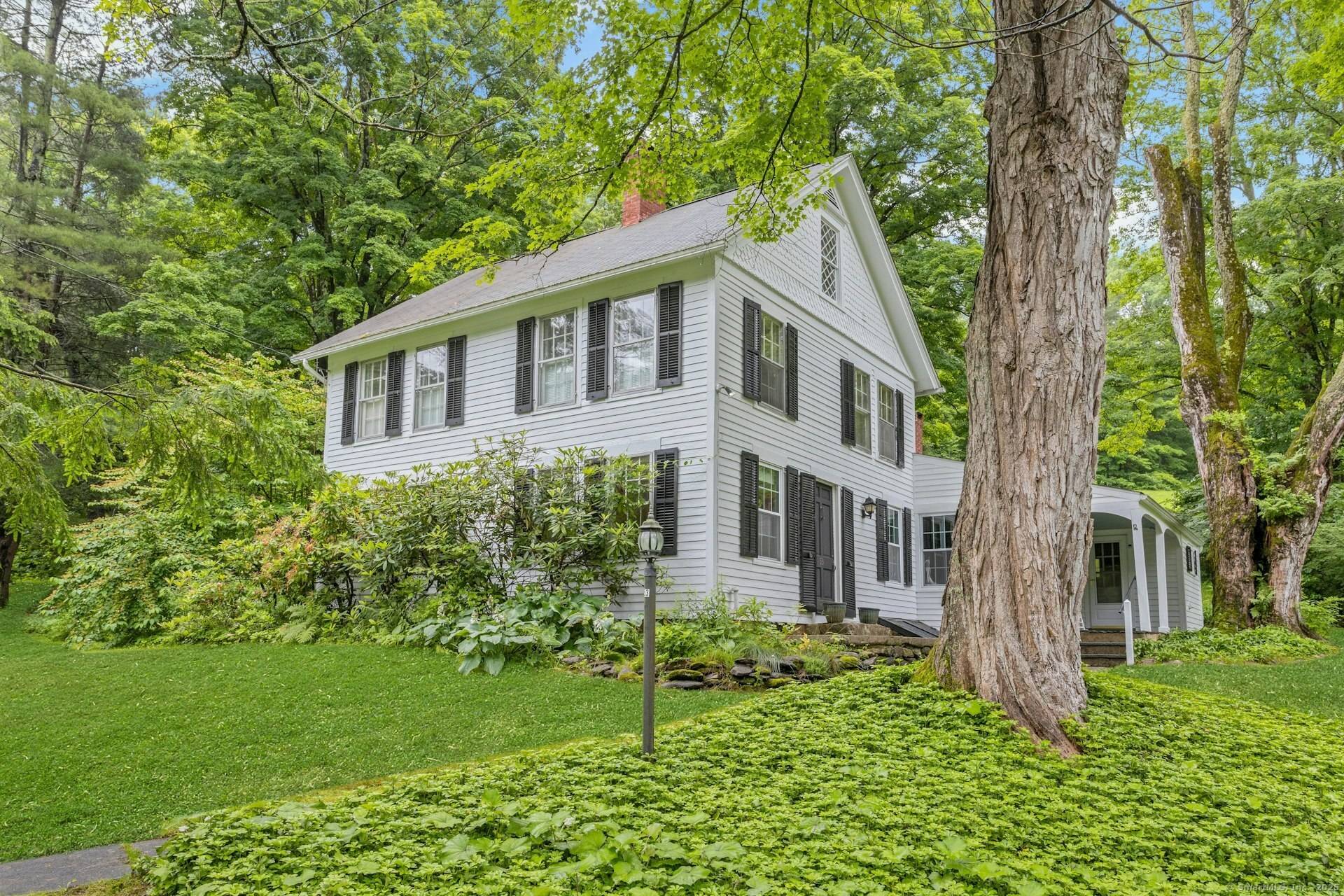 Discover classic New England charm in this beautifully maintained three bedroom antique home, nestled on a spacious parcel of land in the desirable Merryall area of New Milford.