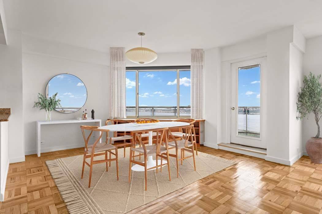 Experience panoramic river views from this this corner two bedroom, two and a half bath Upper West Side apartment.