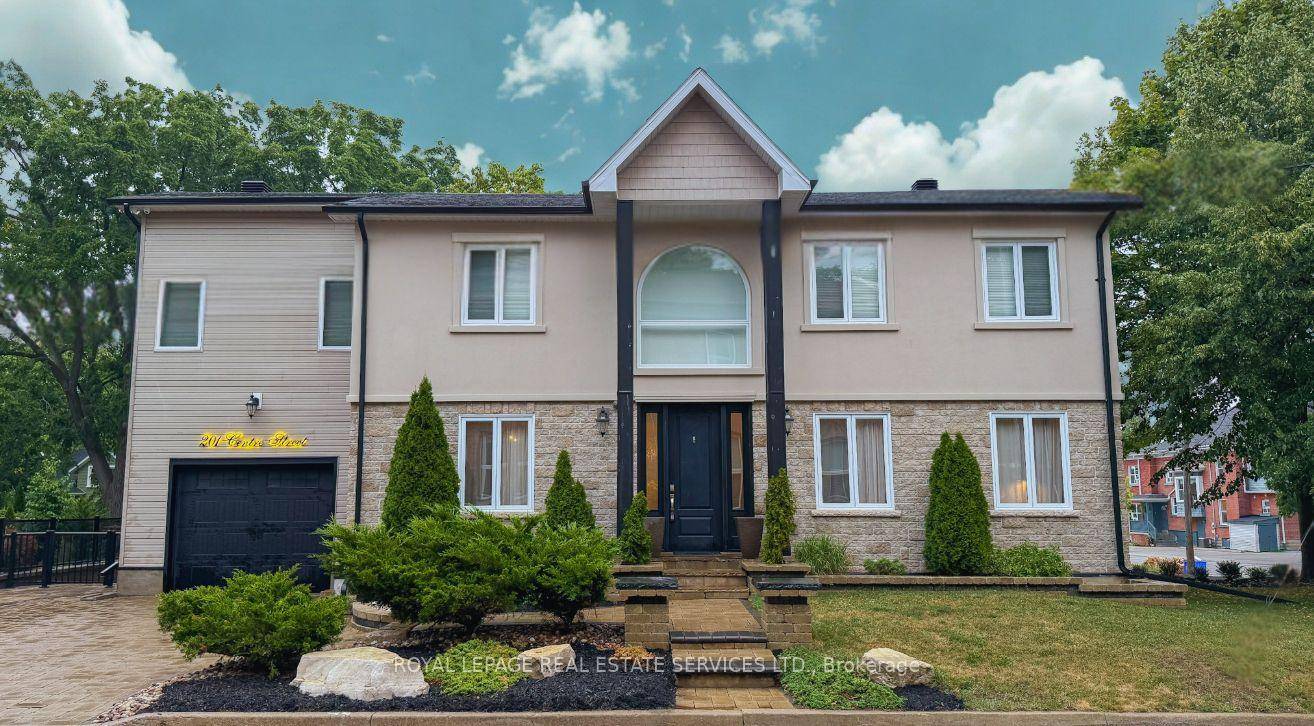 Located just steps from Whitbys vibrant Four Corners district, this exceptional 4 1 bedroom, 4 bathroom custom built home blends timeless design with modern comfort ideal for families or multi ...