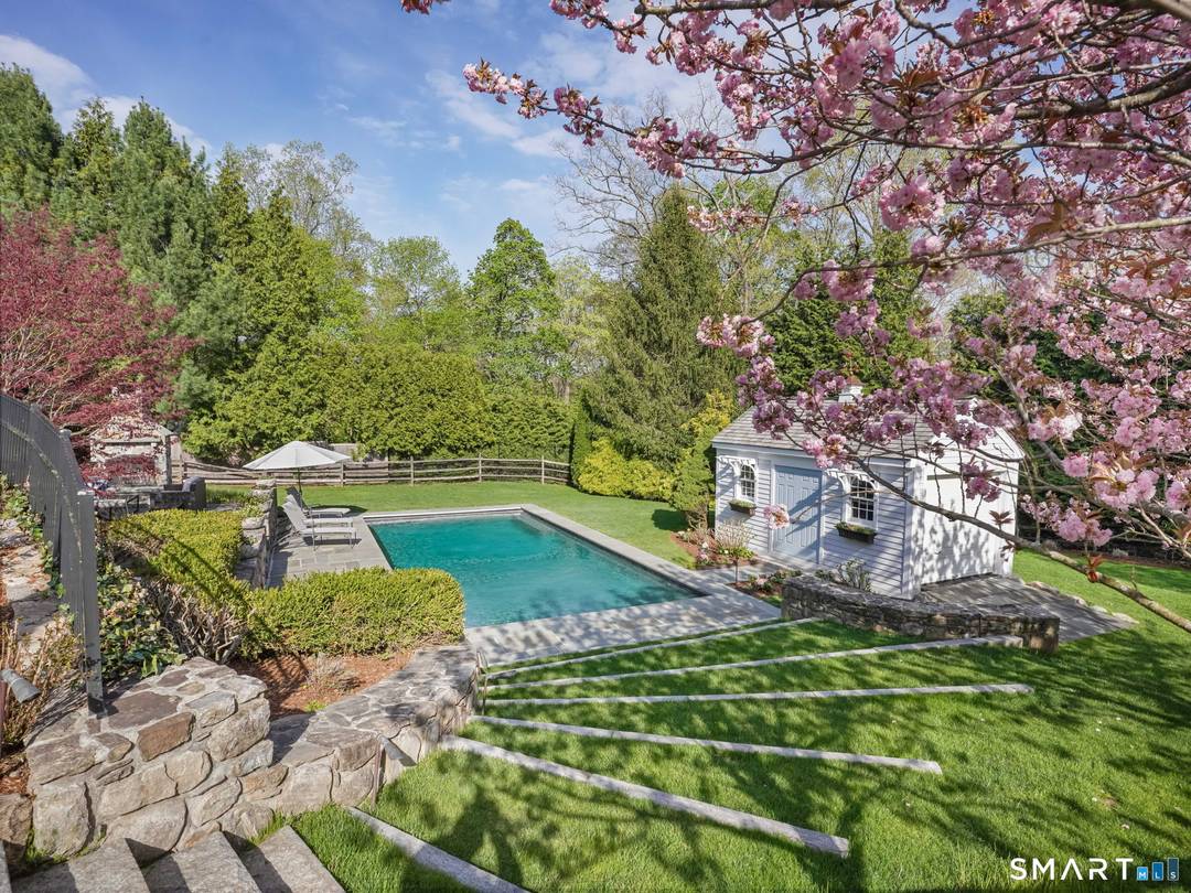 This exceptional and meticulously crafted residence offers the perfect synthesis of luxury, space and privacy in one of New Canaan's most coveted in town locations.