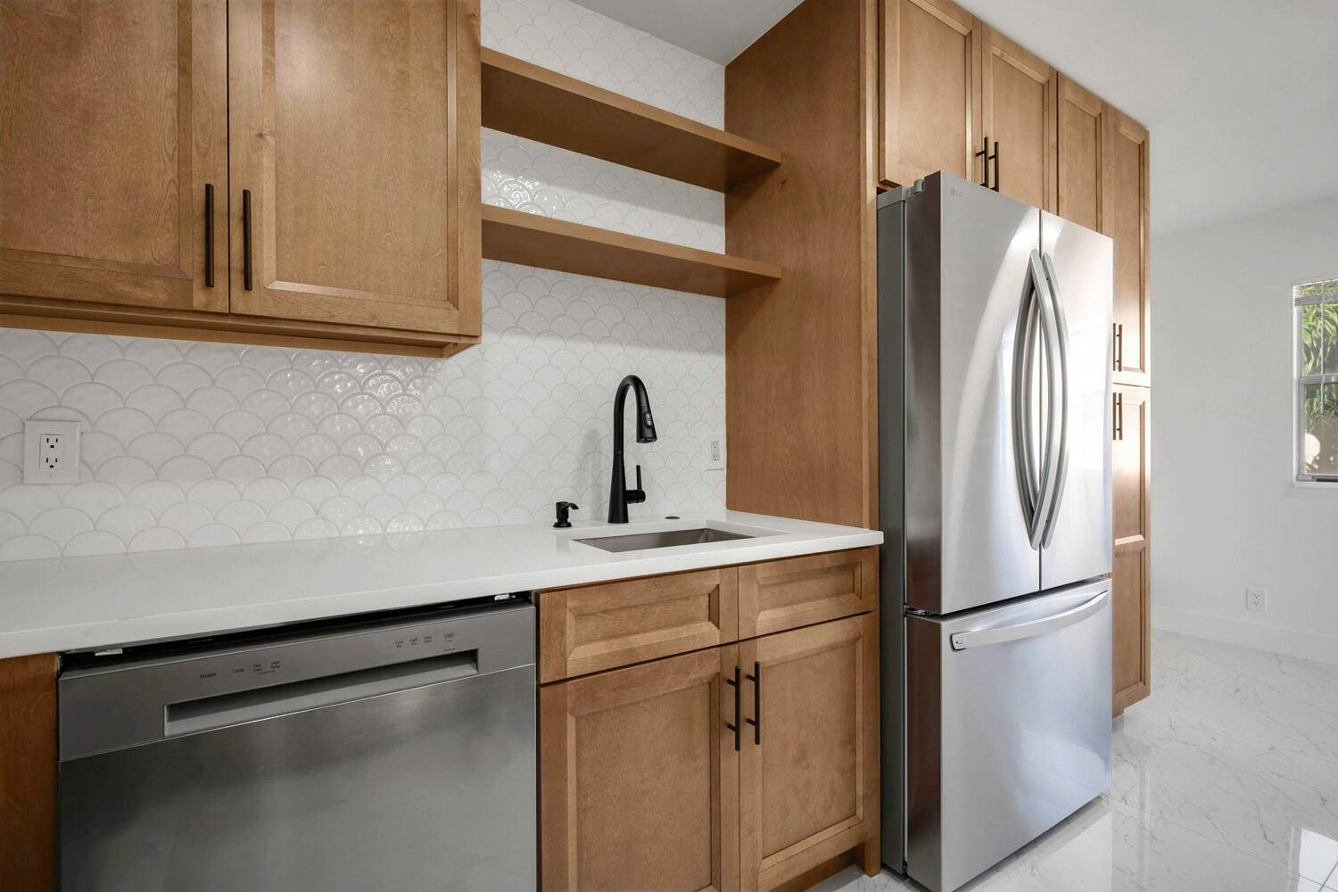 Don't miss out, this completely renovated corner unit is a must see !