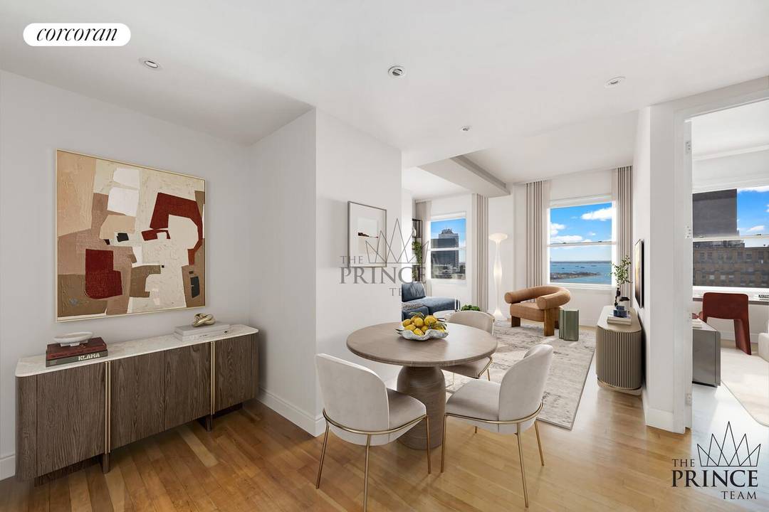 Bathed in brilliant light from its high floor vantage point, this elegant residence showcases sweeping water and harbor views that embody the best of downtown living.