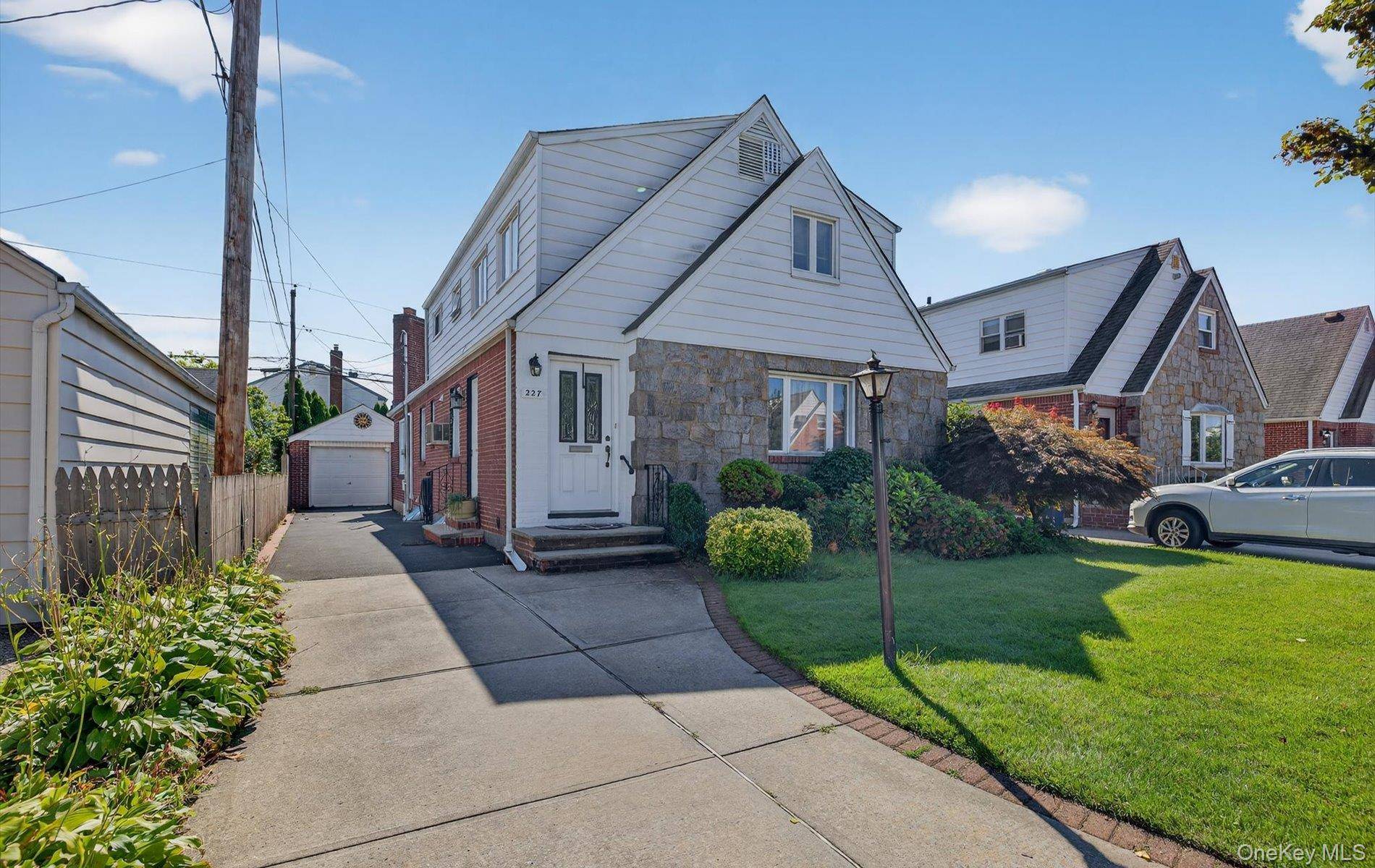 Welcome to this 4 bedroom, 2 bath expanded Colonial offering 1, 900 square feet of versatile living space in the East Williston School District with a Mineola PO Box.