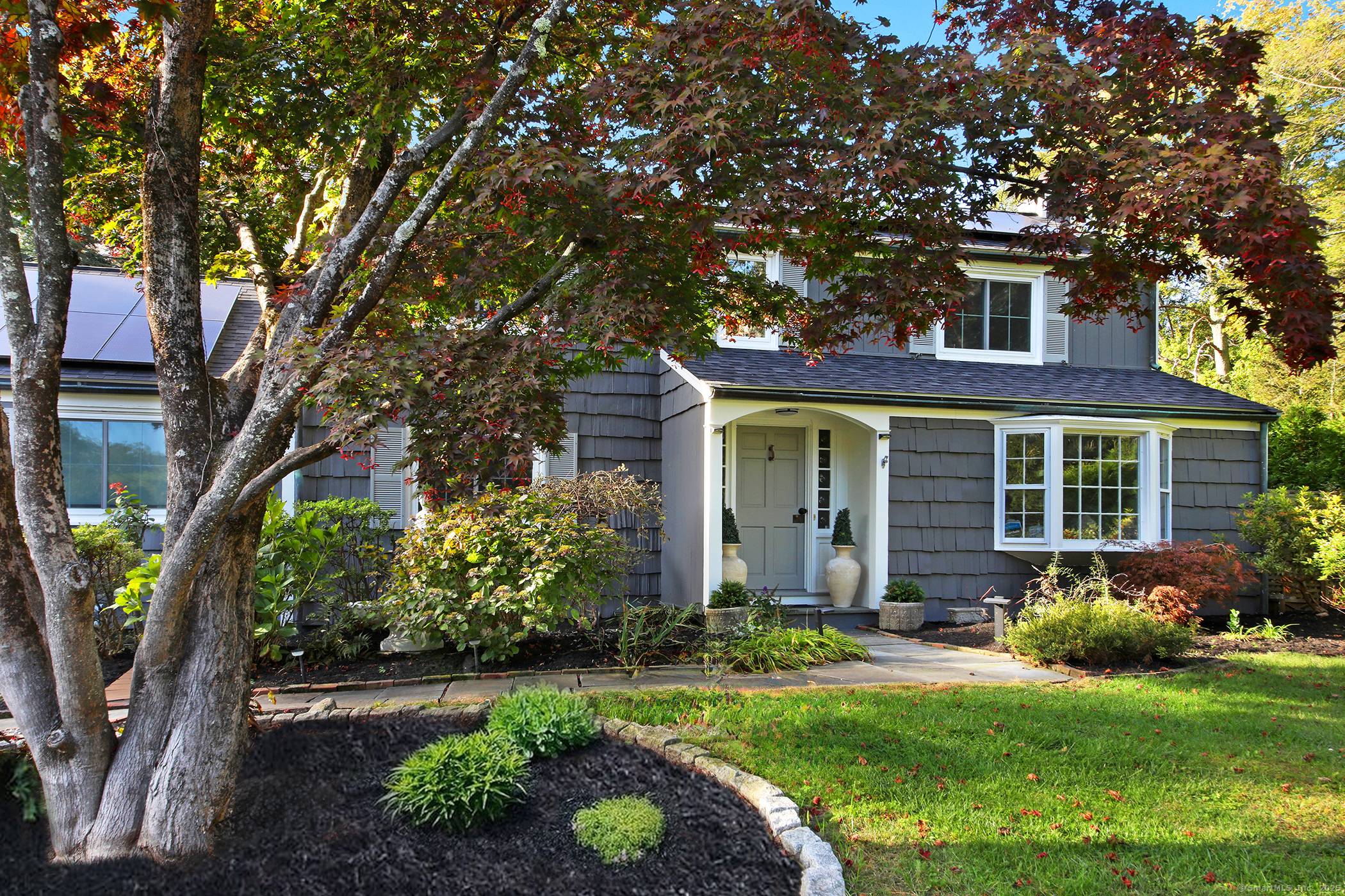 Discover a rare blend of historic charm, modern design, and sustainable living at 401 Wildwood Road a fully restored 5 bedroom, 3 bath designer home set on a private, one ...